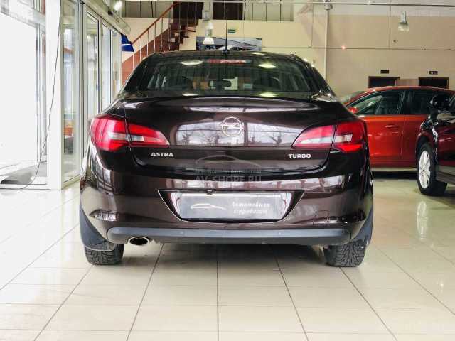 Opel Astra 1.4i AT (140 л.с.) 2013 г.