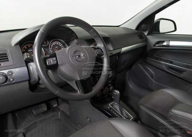 Opel Astra 1.8i AT (140 л.с.) 2011 г.